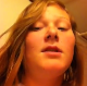 A girl with a southern accent records her facial expressions as she takes a shit and pisses in the bathroom. She tells us how she has to "poop real bad", and proceeds to have a very audible, wet, runny dump in the toilet.